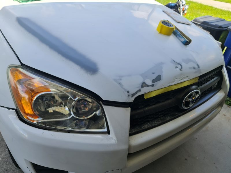 Toyota RAV4 Hood Being Prepped and Repainted by Gunslinger Refinishing