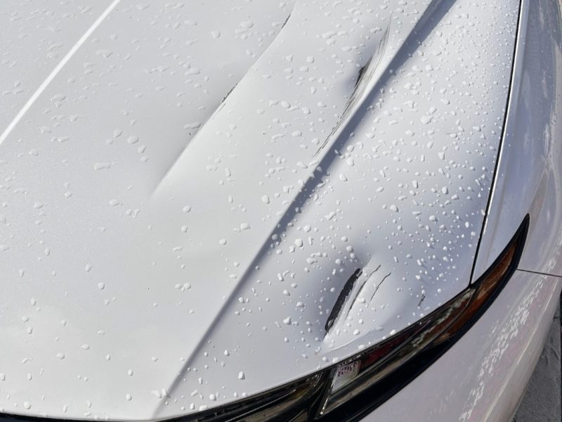 Hyundai Tucson Hood Damage - Before Repair